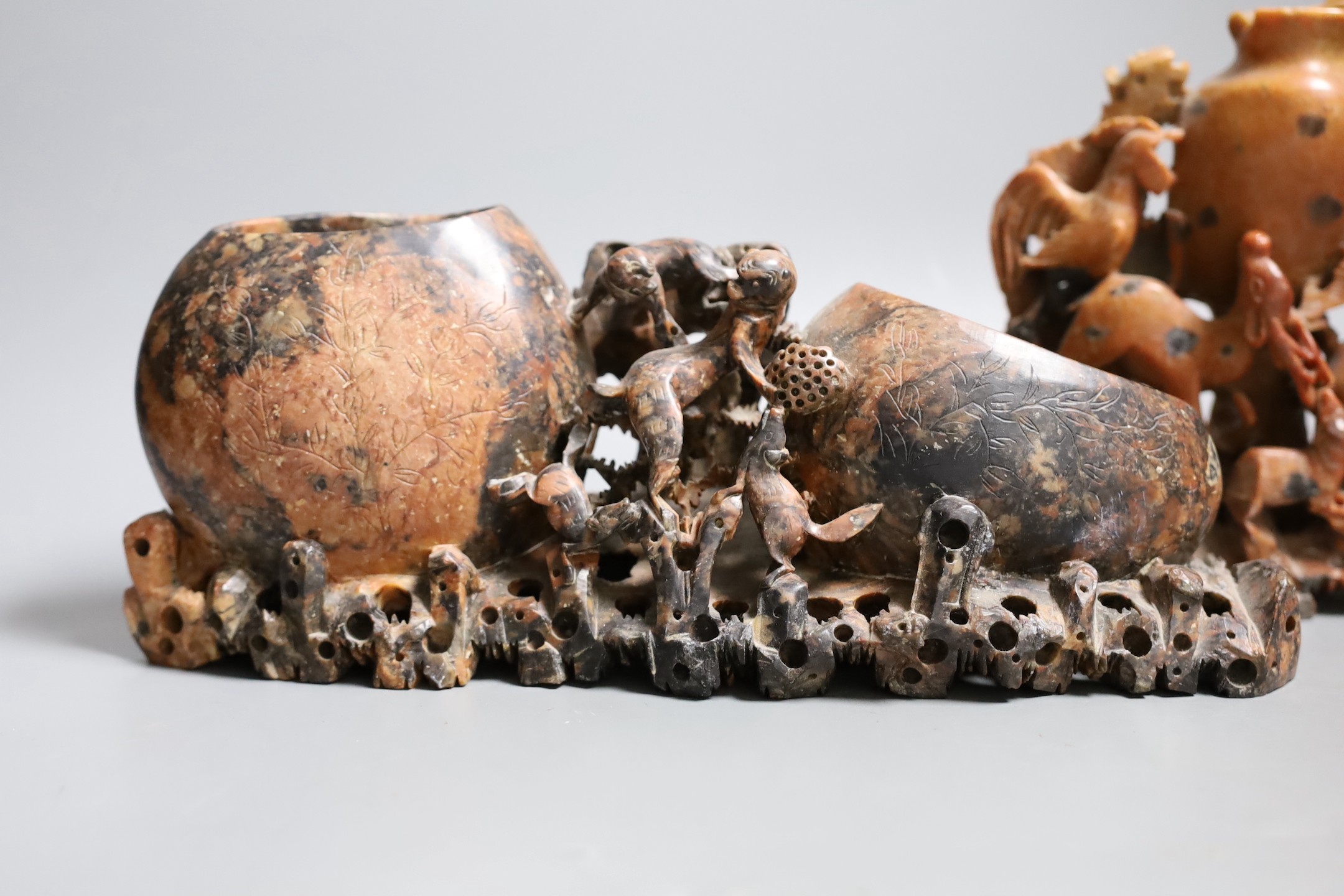 Two Chinese soapstone carvings, widest 29 cms